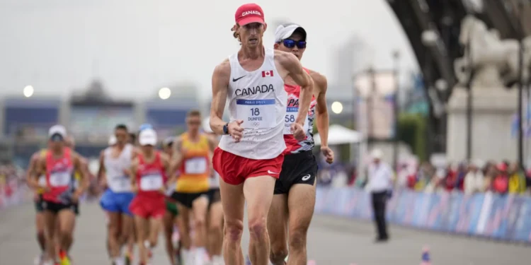 കനേഡിയൻ താരം ഇവാൻ ഡൻഫീ 35 കി.മീ റേസ് വാക്കിൽ ലോക റെക്കോർഡ് തകർത്തു! 1 കനേഡിയൻ താരം ഇവാൻ ഡൻഫീ 35 കി.മീ റേസ് വാക്കിൽ ലോക റെക്കോർഡ് തകർത്തു!