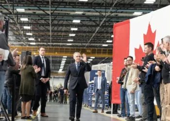 കാർണിയുടെ പ്രചാരണ തന്ത്രങ്ങൾ വിവാദത്തിൽ: ‘സ്റ്റോപ്പ് ദി സ്റ്റീൽ’ ബട്ടണുകൾക്ക് മാപ്പ്