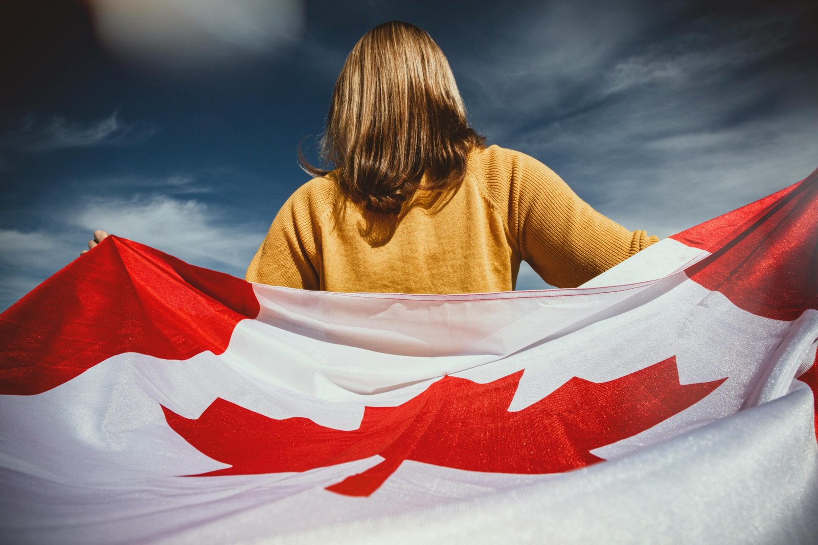lady holding canada flag