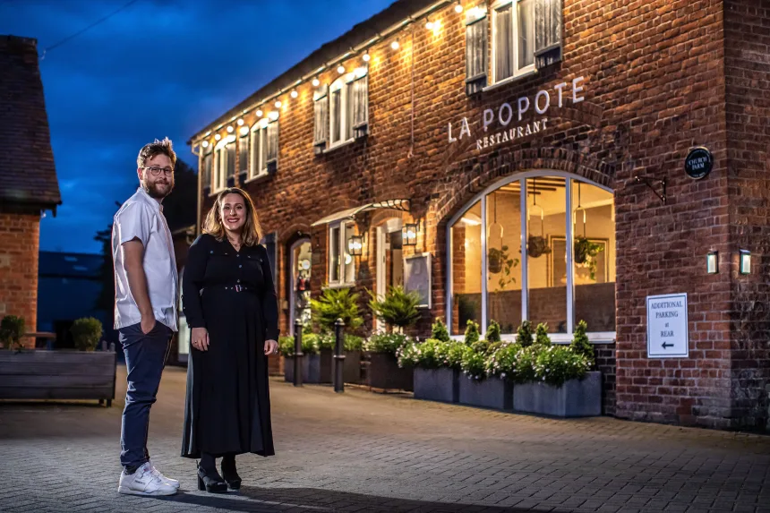 Owners Joseph Rawlins and Gaëlle Radigon outside their French-style restaurant La Popote
