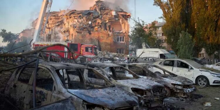 a group of cars in a pile of debris