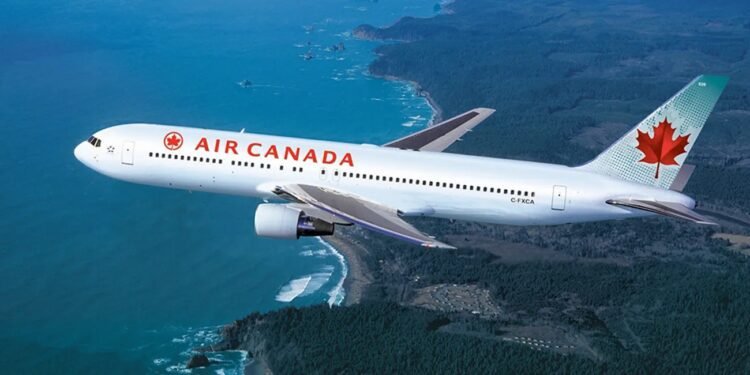 ഇലക്ട്രിക് തീപിടുത്തമെന്ന് സംശയം: എയർ കാനഡ വിമാനം അടിയന്തരമായി തിരിച്ചിറക്കി; യാത്രക്കാരെ രക്ഷപ്പെടുത്തി 1 ഇലക്ട്രിക് തീപിടുത്തമെന്ന് സംശയം: എയർ കാനഡ വിമാനം അടിയന്തരമായി തിരിച്ചിറക്കി; യാത്രക്കാരെ രക്ഷപ്പെടുത്തി