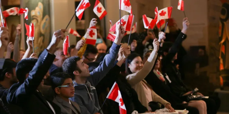 people with canada flag