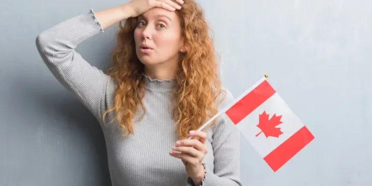 കാനഡയിൽ കുടിയേറാൻ കൂടുതൽ കാത്തിരിക്കണം! അപേക്ഷകളിലെ ബാക്ക്ലോഗ് വർദ്ധിക്കുന്നു, പുതിയ കണക്കുകൾ ഇങ്ങനെ 1 girl with canada flag