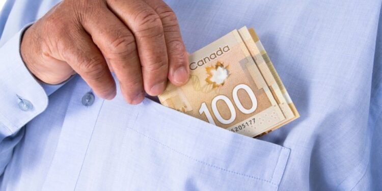 putting money in to pocket