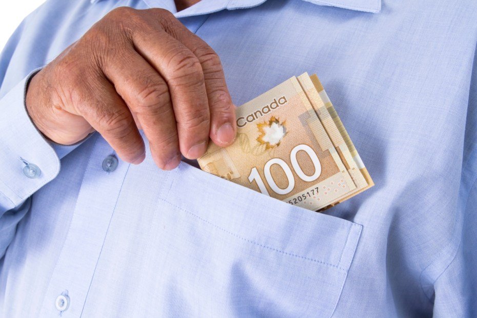 putting money in to pocket