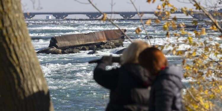 The Iron Scow, a historic ship that has been stranded just above Niagara Falls since 1918, has moved a little further down.