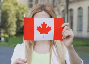 girl holding canada flag