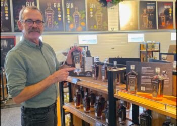 John Cote shows off their award-winning whisky