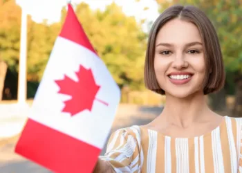 student with a canada flag