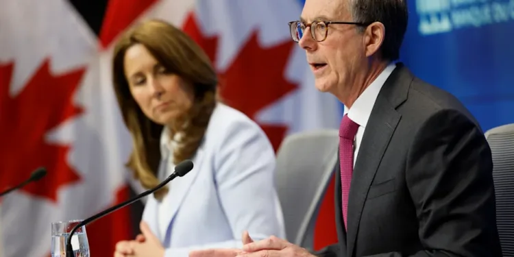 2026-ൽ കാനഡയുടെ സാമ്പത്തിക നയം: പലിശനിരക്കിൽ അനിശ്ചിതത്വം തുടരുമെന്ന് സാമ്പത്തിക വിദഗ്ധർ 1 heres-what-economists-expect-the-bank-of-canada-to-do-in-2026