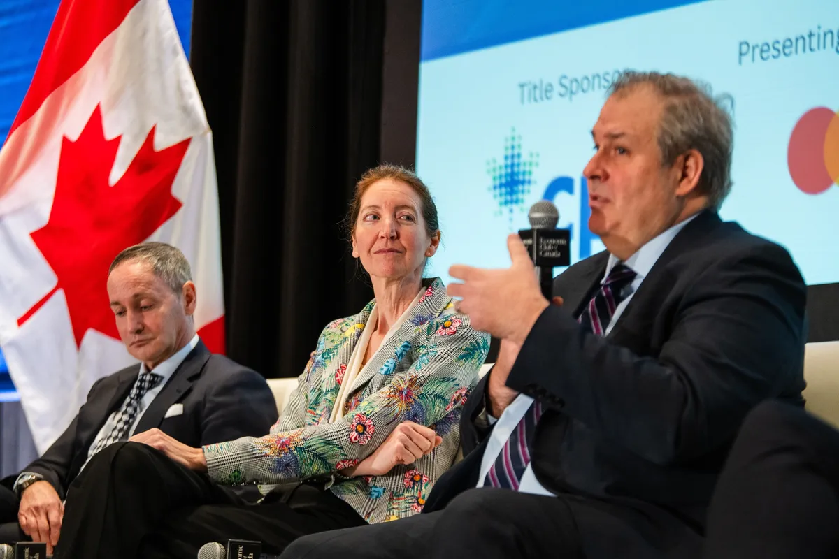 Stefane Marion, left, Beata Caranci and Jean-Francois Perrault during an Economic Club of Canada