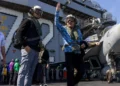US Special Envoy to the Middle East Steve Witkoff waves on board aircraft carrier the USS Abraham Lincoln in the Arabian Sea