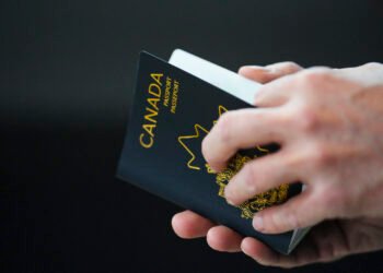 The new Canadian passport is unveiled at an event at the Ottawa International Airport in Ottawa on Wednesday, May 10, 2023. THE CANADIAN PRESS/Sean Kilpatrick