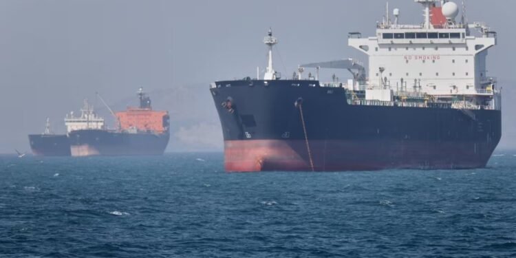 Oil tankers sit at anchor offshore in the Strait of Hormuz off Bandar Abbas