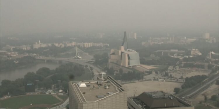 Ontario wildfires spread; heavy smoke blankets Manitoba; public warned to stay alert.