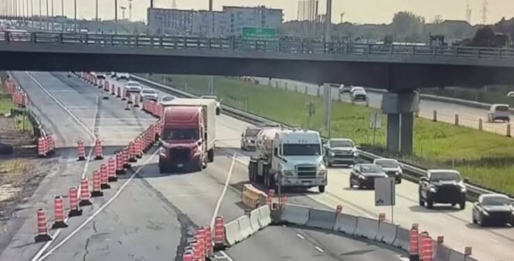 Truck carrying dangerous goods reverses on Highway 20 in Montreal area as cars veer to avoid it
