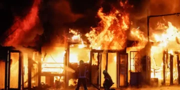 Firefighters work at a site of a book market hit by a Russian missile strike, amid Russia's attack on Ukraine, in Kyiv region, Ukraine. Photo: Reuters