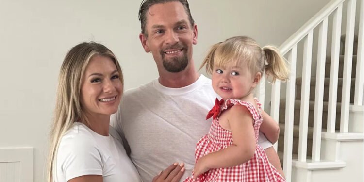 Curtis Wright, centre, his fiancée Kayla Thomsen and their daughter are pictured in this undated handout photo. Wright was recently returned back to Canada from the U.S. on a removal order after being detained by ICE for the past nine months. THE CANADIAN PRESS/Handout - Kayla Thomsen (Mandatory Credit)