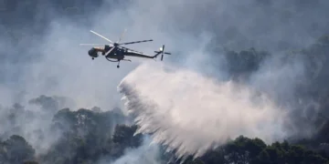 Two killed in helicopter collision while battling wildfires in Greece.