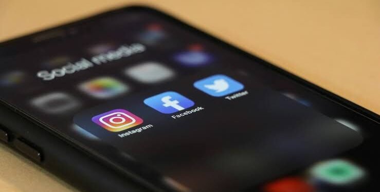 The image displays a smartphone screen featuring an open app folder