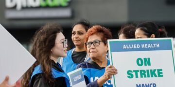 Striking Dynacare workers on a picket line in Winnipeg on Tuesday morning. Hundreds of lab technicians and technologists have been ordered back to work Wednesday following a decision from the Manitoba Labour Board.