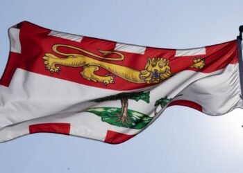 The Prince Edward Island provincial flag flies on a flagpole in Ottawa