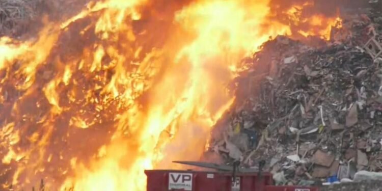 A fire burning at Ecco Recycling in southeast Calgary