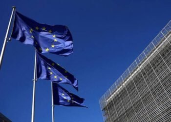 European Union flags outside the European Commission headquarters in Brussels