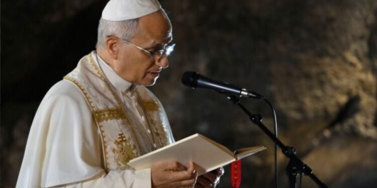 Pope Leo joins pilgrims during candlelit procession in Lourdes