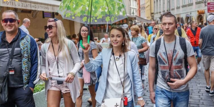 Tourists on a free walking tour with a local guide
