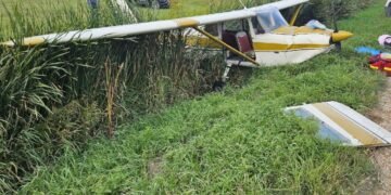 plane is pictured in a ditch at the Portage la Prairie Airport