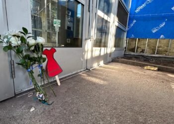 Flowers placed outside the Montreal apartment of Leila Ben Salem