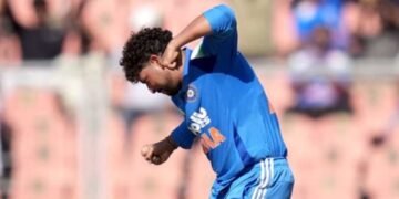 Indian cricketer celebrating after taking a wicket