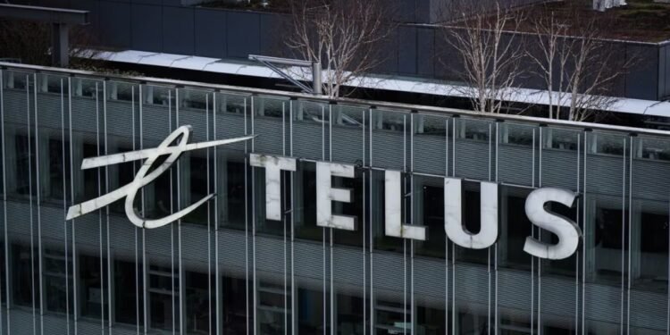 The Telus Corporation logo is seen on the outside of the company's headquarters in downtown Vancouver,