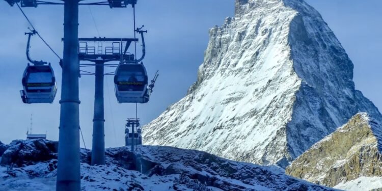 Gondolas go up next to the Matterhorn in Zermatt, Switzerland,